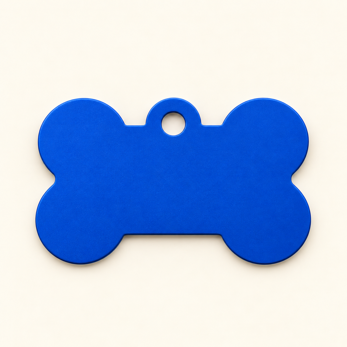 Blue bone-shaped pet ID tag, blank before engraving