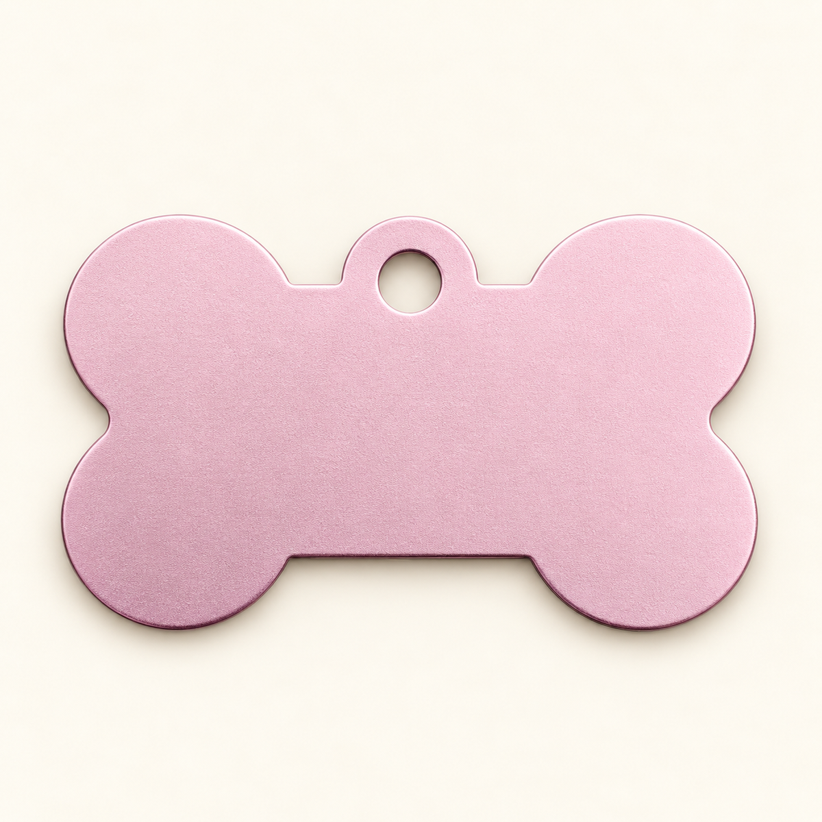 Light Pink bone-shaped pet ID tag, blank before engraving