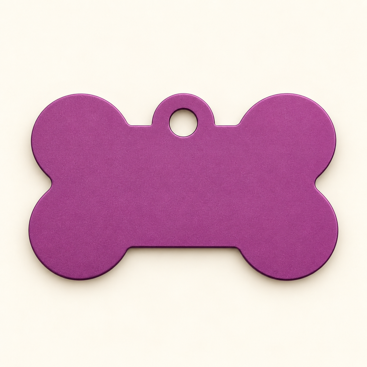 Purple bone-shaped pet ID tag, blank before engraving