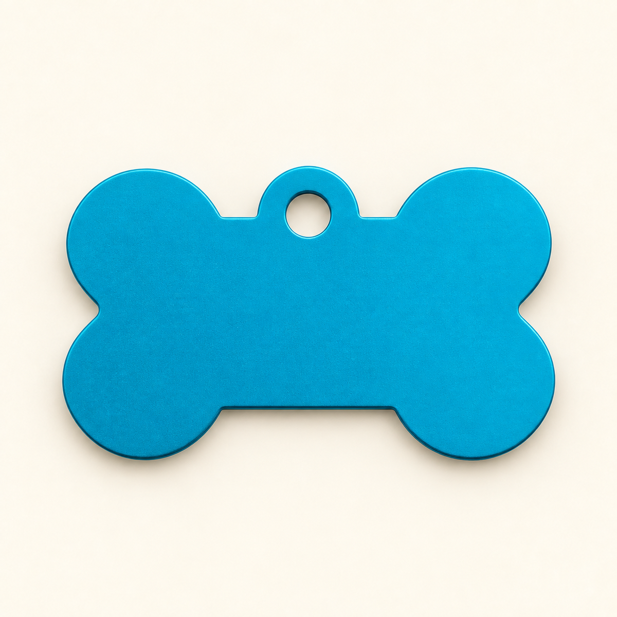 Turquoise bone-shaped pet ID tag, blank before engraving
