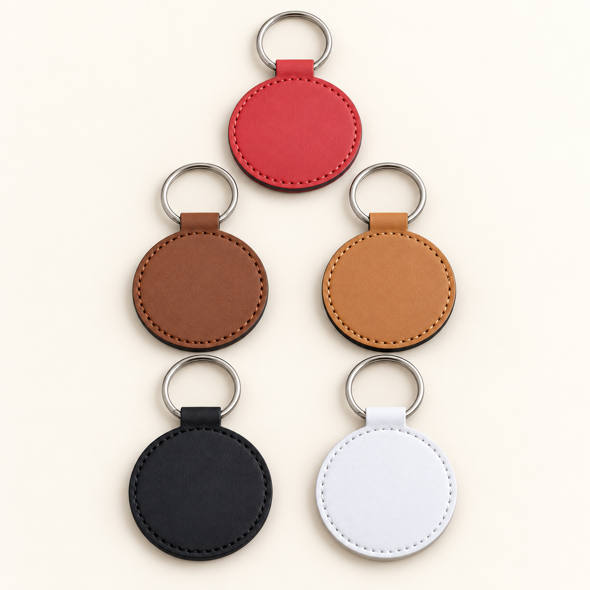 Five available colours of blank round faux leather keyrings