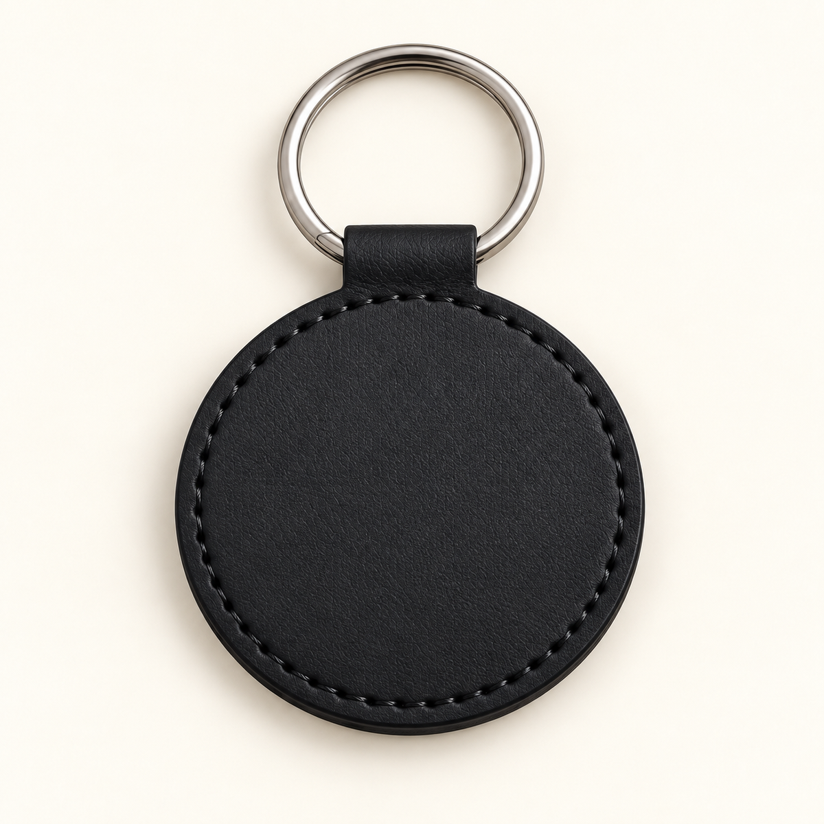 Black round faux leather keyring, blank before engraving